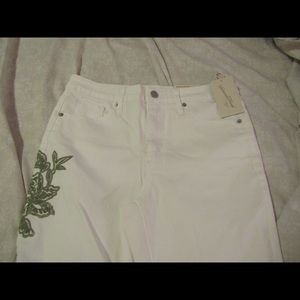 White embroidered jeans